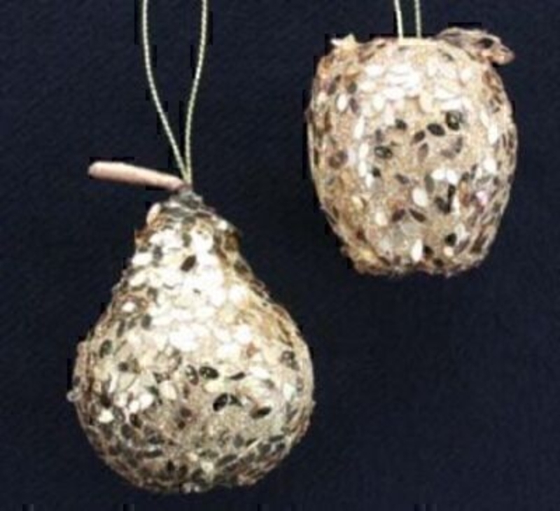Set of Gold Sequin Apple and Pear Christmas Tree Decorations Set of Gold Sequin Apple and Pear Christmas Tree Decoration by Gisela Graham. Hanging Christmas Tree Decorations. Both apple and pear one of each included. This set of Christmas Tree is a tasteful addition to your Christmas Decorations Size 5x5x5cm<br><br>
If it is Christmas Tree Decorations to be sent anywhere in the UK you are after than look no further than Booker Flowers and Gifts Liverpool UK. Our Tree Decorations are specially selected from across a range of suppliers. This way we can bring you the very best of what is available in Tree Decorations.<br><br>
Here at Booker Flowers and Gifts we love Christmas and as such we have a massive range of traditional and contemporary Christmas Decorations.<br><br>
Gisela loves Christmas Gisela Graham Limited is one of Europes leading giftware design companies. Gisela made her name designing exquisite Christmas and Easter decorations. However she has now turned her creative design skills to designing pretty things for your kitchen, home and garden. She has a massive range of over 4500 products of which Gisela is personally involved in the design and selection of. In their own words Gisela Graham Limited are about marking special occasions and celebrations. Such as Christmas, Easter, Halloween, birthday, Mothers Day, Fathers Day, Valentines Day, Weddings Christenings, Parties, New Babies. All those occasions which make life special are beautifully celebrated by Gisela Graham Limited.<br><br>
Christmas and her love of this occasion is what made her company Gisela Graham Limited come to fruition. Every year she introduces completely new Christmas Collections with Unique Christmas decorations. Gisela Grahams Christmas ranges appeal to all ages and pockets.<br><br>
Gisela Graham Christmas Tee Decorations are second not none a really large collection of very beautiful items she is especially famous for her Fairies and Nativity. If it is really beautiful and charming Christmas Decorations you are looking for think no further than Gisela Graham.<br><br>
These Beautiful Gold Glitzy apple and pear by Gisela Graham are a stylish addition to any Christmas Tree they will fit into many Christmas Themes and are sure to be a favorite for years to come. Remember Booker Flowers and Gifts for Gisela Graham Tree Decorations that can be send anywhere in the UK.